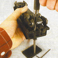 Here's another easy job to do with the Original Riveter. You can tighten brake wheels and their base shaft at the same time on Lionel dump cars using the BRT1-1 Tip with the BR1-P1 Backing Stake.